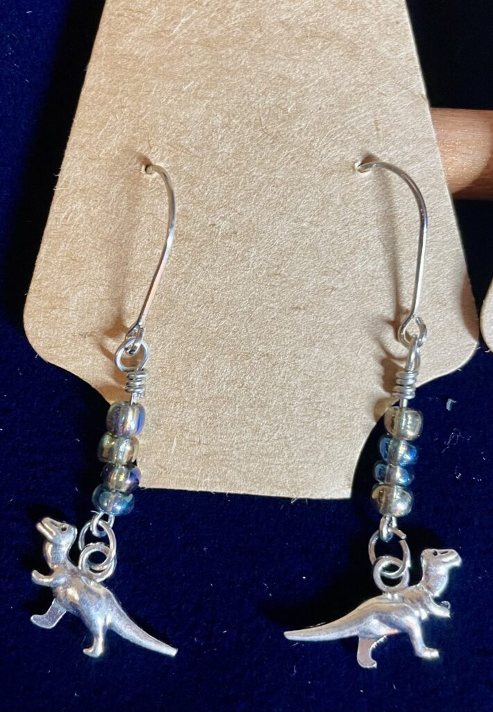 Dinosaur Earrings with Four-Stacked Purple Iridescent Glass Beads Silver Wrap