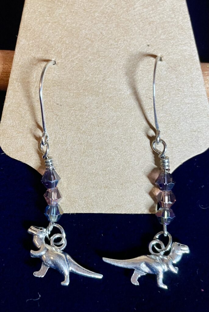 Dinosaur Earrings with Three-stack purple Bicorn Crystals Silver Wrap