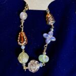 Czech Glass Bead Bracelet in Purple, Green and Amber with Gold Wrap